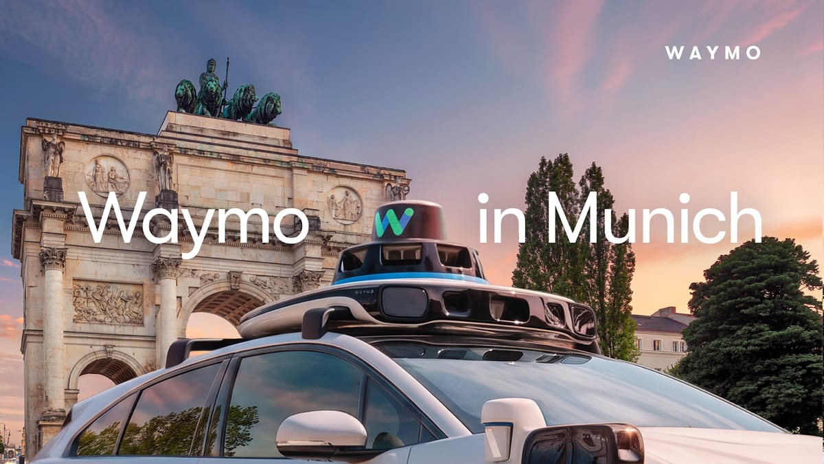 Official Waymo announcement image showing a white Jaguar I-PACE with a roof mounted sensor dome parked in front of the Siegestor arch in Munich at sunset, under the caption Waymo in Munich.