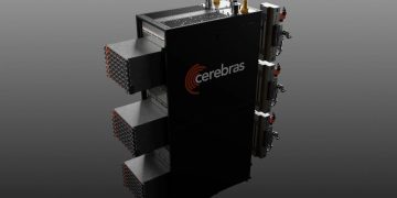 Product render of the Cerebras CS-4 rack on a grey studio background, a black cabinet with the Cerebras logo and three horizontal Wafer-Scale Backpack modules slid partway out of the left side, each showing dense rows of orange-tipped connectors, with power and liquid cooling hardware on the right.