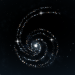 OpenAI announcement image for GPT-6 Astra, a spiral galaxy of white, blue and amber points of light curling around a bright core on a near black star field.
