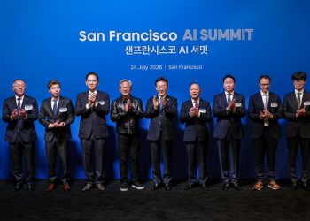 Official San Francisco AI Summit photograph dated 24 July 2026 showing eleven executives and officials applauding on stage in front of a blue backdrop.