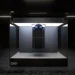 IBM Quantum System One quantum computer inside a glass enclosure in a dark room