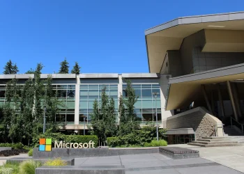 Microsoft sign in front of an office building on the Microsoft headquarters campus in Redmond, Washington