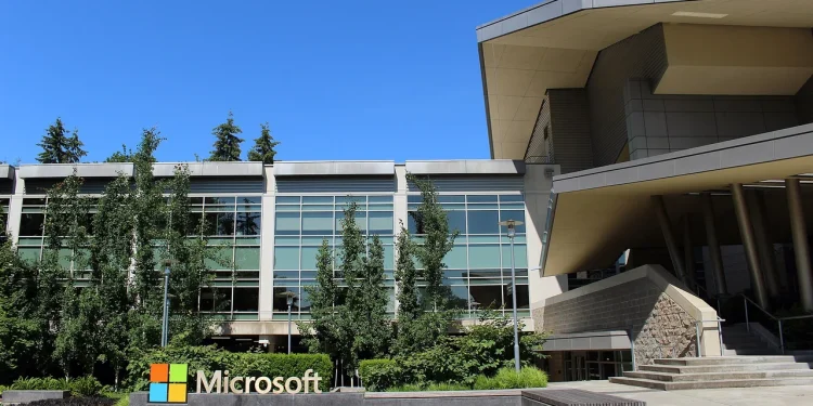 Microsoft sign in front of an office building on the Microsoft headquarters campus in Redmond, Washington