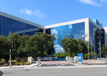 Intel headquarters in Santa Clara, California, a glass office building with the Intel sign at the entrance