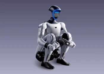 Unitree humanoid robot in a crouching pose with a glowing blue visor, official product render on a purple gradient background